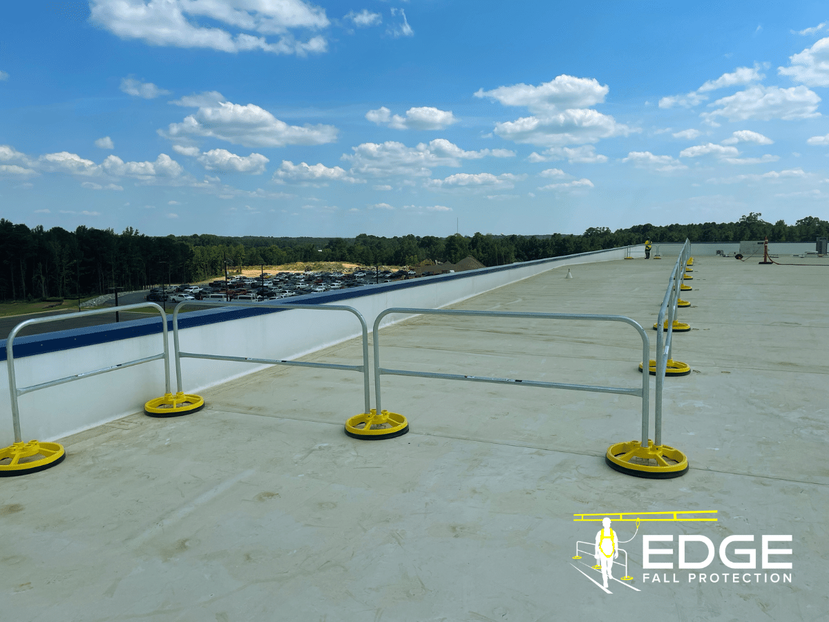 Engineering Guide to Non-Penetrating Guardrails: How They Stay Put Without Anchors
